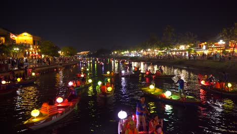Beautiful-nighttime-view-of-Hoi-An-city-with-river-and-lanterns-boats