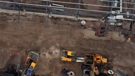 ALDI-supermarket-construction-building-site-top-down-aerial-view-industrial-framework-development,-UK