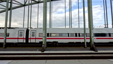 17-April-2023---German-ICE-High-Speed-Train-Crossing-Hohenzollern-Bridge-In-Cologne