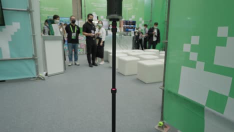 Remote-Controlled-360-Degree-Camera-Car-Hovering-in-a-Technology-Summit