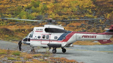 An-Airlift-cargo-helicopter-lands-on-the-gravel-pad