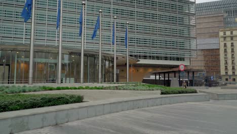 EU-sign-at-the-entrance-of-European-Commission-headquarters-Berlaymont-building,-Cinematic-shot