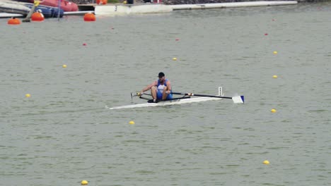 Man-rowing-in-a-single-scull-on-the-rowing-arena-track