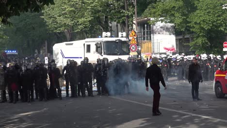 French-police-use-a-water-canon-during-the-May-Day-protest-in-Paris,-France