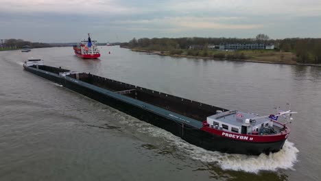 Empty-cargo-container-ship-Procyon-sailing-across-Oude-Mass-river