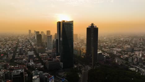 Aerial-view-of-a-queue-of-high-rise-on-Reforma-avenue-in-downtown-Mexico-city