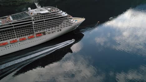 Aerial-Shot-of-Cruise-Ship-Casting-Off-in-Geirangerfjord