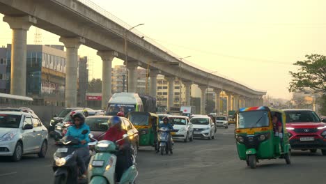 Rush-hour-traffic-at-Hosur-road-near-silk-board-junction-highway-at-sunset,-wide-angle-shot,-Bengaluru,-India