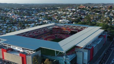 Aerial-drone-shot-tracking-away-from-Brisbane's-Suncorp-Stadium,-with-stunning-aerial-views-of-inside-the-stadium