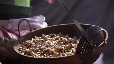 Peanuts-are-being-roasted-for-sale-in-the-fair-premises