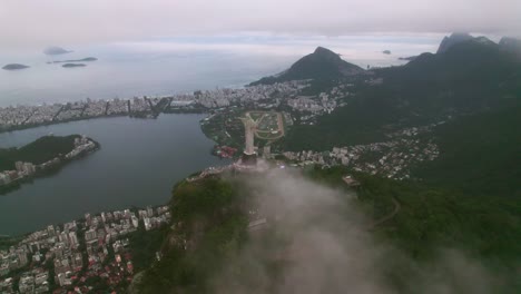 Aerial-View-of-Christ-The-Redeemer-Statue-in-Rio-de-Janeiro-Brazil-Above-Clouds,-Drone-Shot