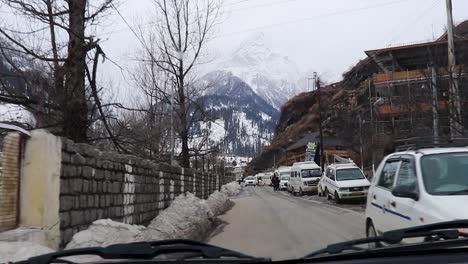 snow-cap-mountain-view-from-car-at-day-from-flat-angle-video-is-taken-at-manali-himachal-pradesh-india-on-Mar-22-2023