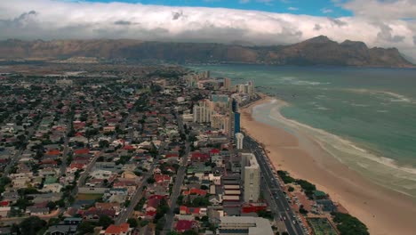 established-shot-of-Cape-Town-city-and-beach-view,-Aerial-view
