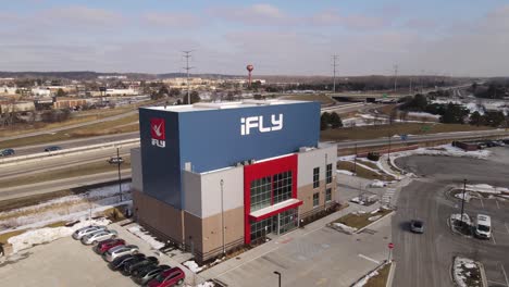 iFly-indoor-skydiving-facility-building-exterior-in-Michigan,-aerial-drone-view