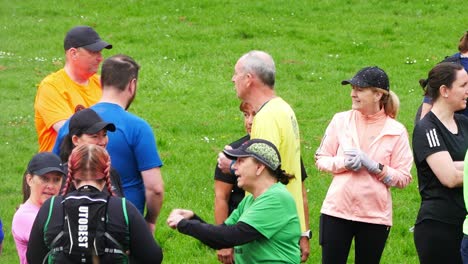 Group-of-diverse-active-lifestyle-running-club-adults-meeting-for-Sunday-fun-run