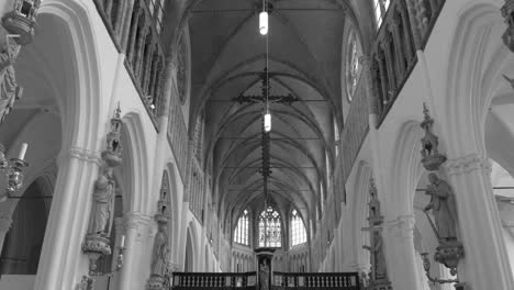 Tilt-down-shot-of-interior-inside-the-Protestant-Christian-church-of-Our-Lady-in-the-city-of-Bruges,-Belgium