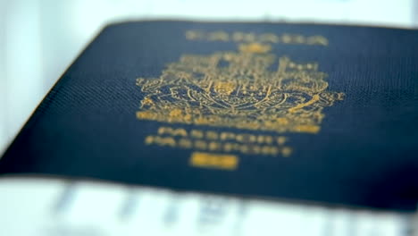 Close-Up-Canadian-Passport-with-Boarding-Pass---At-24-fps