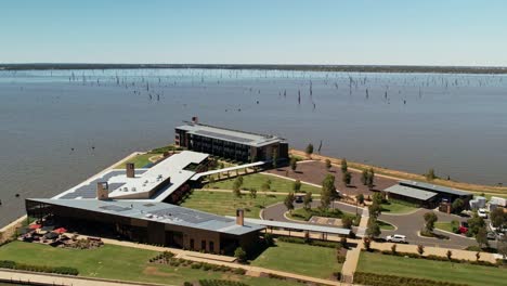 Yarrawonga,-Victoria,-Australia---3-March-2023:-Approaching-the-Sebel-Hotel-over-the-golf-course-with-Lake-Mulwala-in-the-background