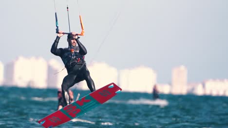 Sportsman-practicing-kite-surf-sport-at-the-beach-on-a-windy-day-at-the-Spanish-coasts