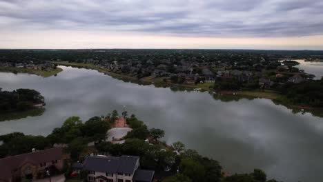 Editorial-Aerial-footage-flying-over-houses-and-Lake-Lewisville-in-Highland-Village-Texas