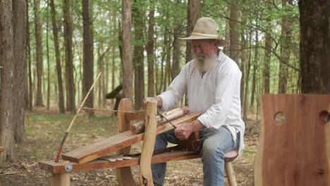 A-furniture-maker-who-uses-traditional-tools-and-techniques-to-create-unique,-handcrafted-cedar-pieces-that-evoke-a-sense-of-history-and-craftsmanship