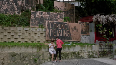 Female-tourists-making-memories-at-Petaling-street-Kuala-Lumpur