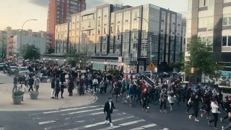 Timelapse-shot-of-Black-Lives-Matter-protesters-marching-down-the-street-in-Williamsburg,-New-York-City