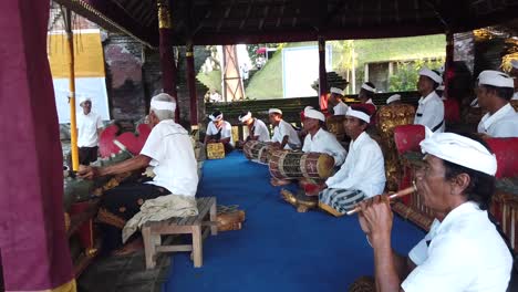 Gamelan-Music-Group-Plays-Percussion-Instruments-in-Bali-Indonesia,-Hindu-Ceremony-at-The-Temple,-Southeast-Asian-Culture