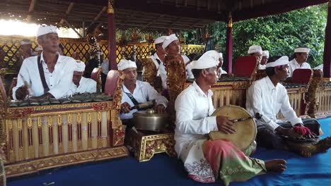 Group-of-Balinese-Musicians-Play-Gamelan-Gong-Kebyar-at-Hindu-Bali-Ceremony,-Ancient-Musical-Form-of-Southeast-Asia