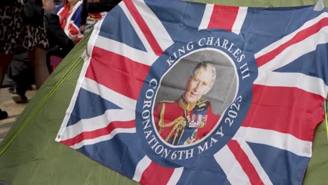 Tent-Bedecked-With-Union-Jack-Flag-And-Kings-Charles-Photo-In-Middle-Lining-The-Mall-For-Coronation-Ceremony