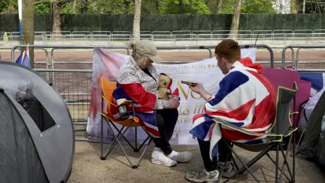 4-May-2023---Journalist-Interviewing-Royal-Super-Fan-Camping-Beside-The-Mall-For-King-Charles-Coronation-Ceremony