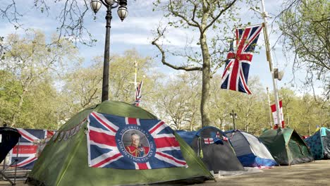 4-May-2023---Row-Of-Tents-Bedecked-With-Union-Jack-Flag-And-Kings-Charles-Photo-In-Middle-Lining-The-Mall-For-Coronation-Ceremony