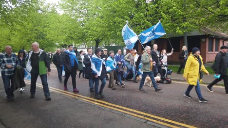 Wide-shot-of-Scottish-activists-marching-for-Scottish-Independence-in-Glasgow-Green
