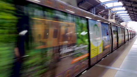 metro-train-arriving-at-station-at-morning-from-flat-angle-video-is-taken-at-hauz-khas-metro-station-new-delhi-india-on-Apr-10-2022