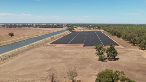 Mulwala,-New-South-Wales,-Australia---18-February-2023:-Aerial-view-approaching-the-ESCO-Pacific-Solar-Farm-in-Mulwala-New-South-Wales