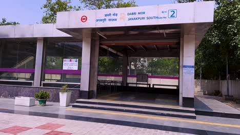 metro-station-entrance-gate-at-afternoon-from-flat-angle-video-is-taken-at-dabri-mor-metro-station-new-delhi-india-on-Apr-10-2022