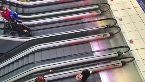 View-from-a-high-angle-of-escalators-in-an-airport-in-slow-motion