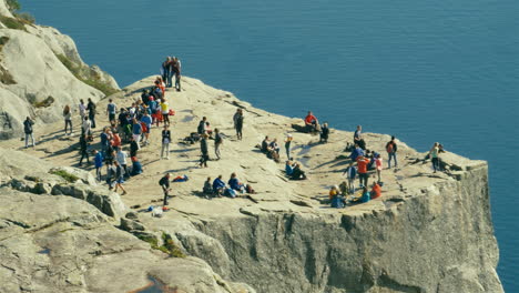 Crowded-rock-cliff-edge-mountain-camp-of-Preikestolen-Pulpit-Rock-in-Forsand-in-Rogaland-county