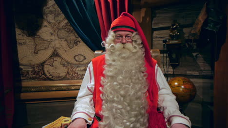 Santa-Claus-sits-in-his-big-chair-and-patiently-waits-for-interviewers-to-be-ready-to-begin-his-interview