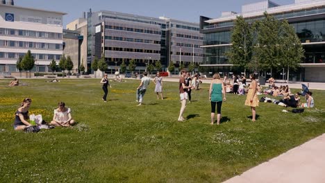 KTH-Royal-Institute-of-Technology-students-enjoy-a-sunny-afternoon-on-the-lawn