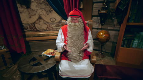 A-very-well-acted-Santa-Claus-conducts-an-interview-while-seated-in-a-well-themed-room-to-discuss-particulars-of-his-miraculous-annual-trip-around-the-world