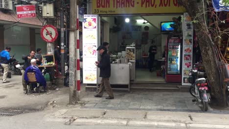 Storefront-in-busy-Hanoi,-Vietnam