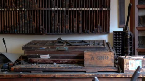 Untidy-antique-letterpress-wood-printing-manufacturing-workshop-museum,-Ireland
