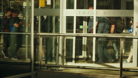 Panning-People-Going-Through-the-Exit-Door-at-the-Malaga-Airport-Terminal