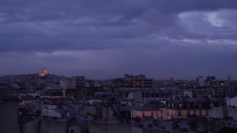 Rooftop-View-Of-Paris-In-The-Evening-With-Dramatic-Clouds