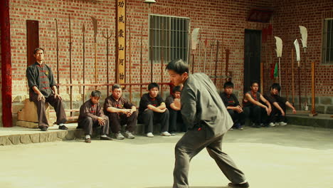 Disciplined-Martial-Arts-Fighter-demonstrates-Taiwanese-Kung-Fu-Skills-Tracking-Shot