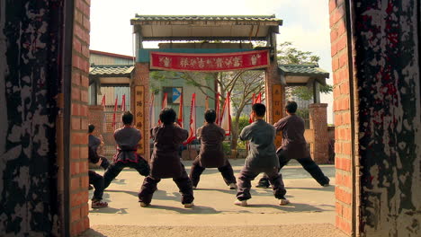 Batch-of-martial-arts-students-learning-together-at-academy-in-Taipei