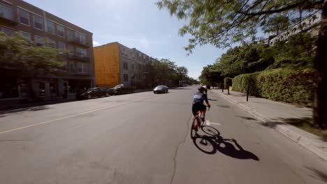 POV-Cycling-And-Turning-Onto-Saint-Denis-Street-In-Montreal,-Canada