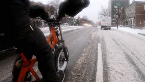 Timelapse-Side-Angle-POV-Of-Courier-On-Radburro-Travelling-Along-Winter-Snow-Roads-In-Downtown-Montreal