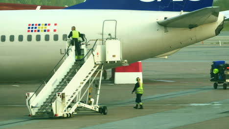 Airplane-Stairs-Moved-away-from-Aircraft-by-Crew
